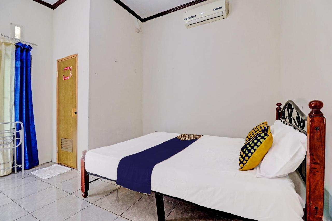 Готель Oyo 92056 Asri Kost Syariah Джамбі Екстер'єр фото